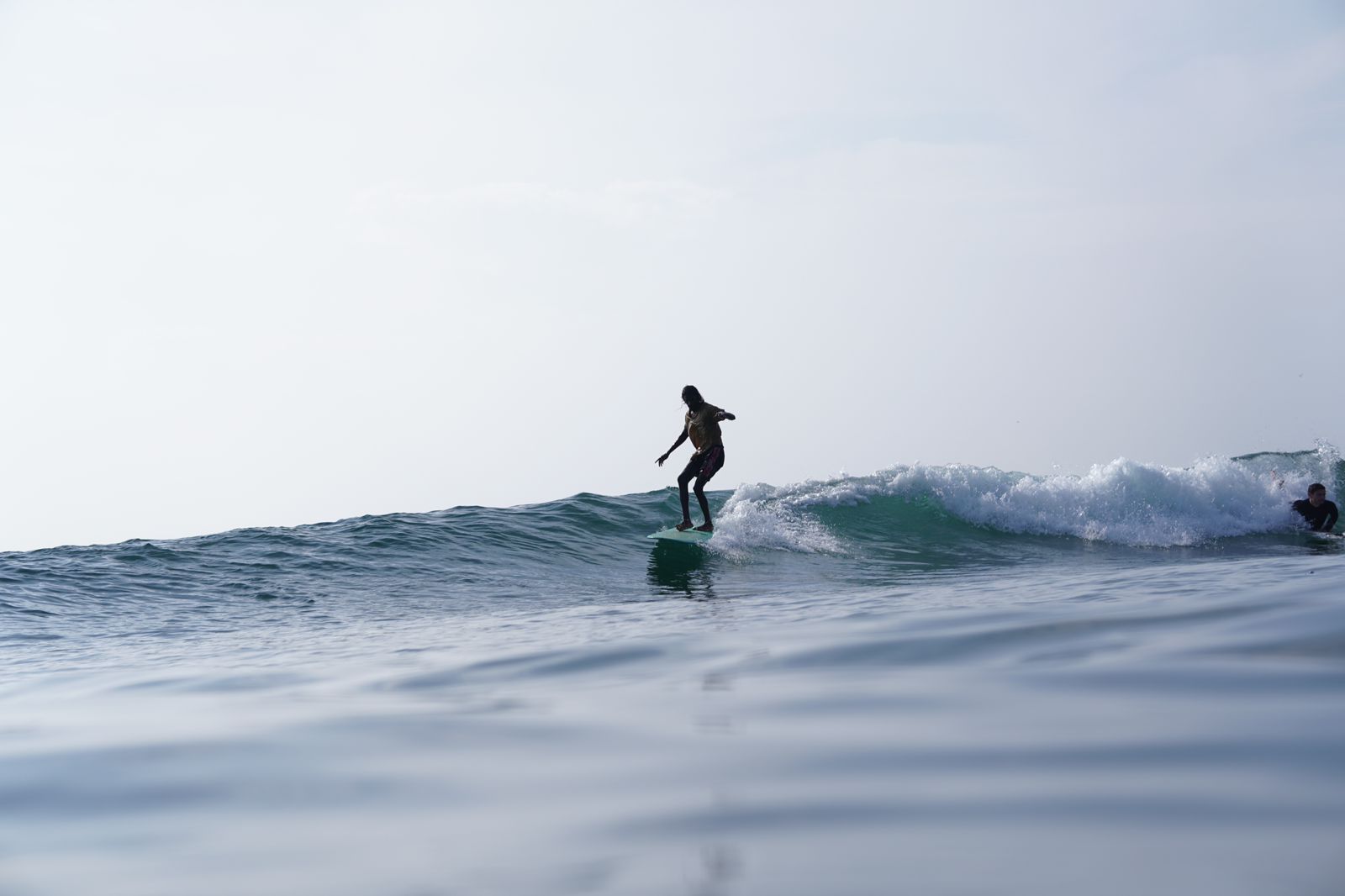 Achi surfing from the water's point of view
